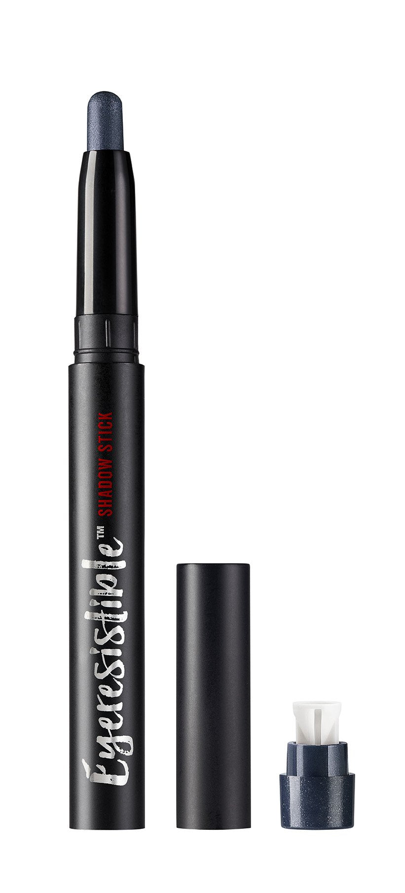 Navy shadow stick uncapped with its cap and built-in sharpener beside it