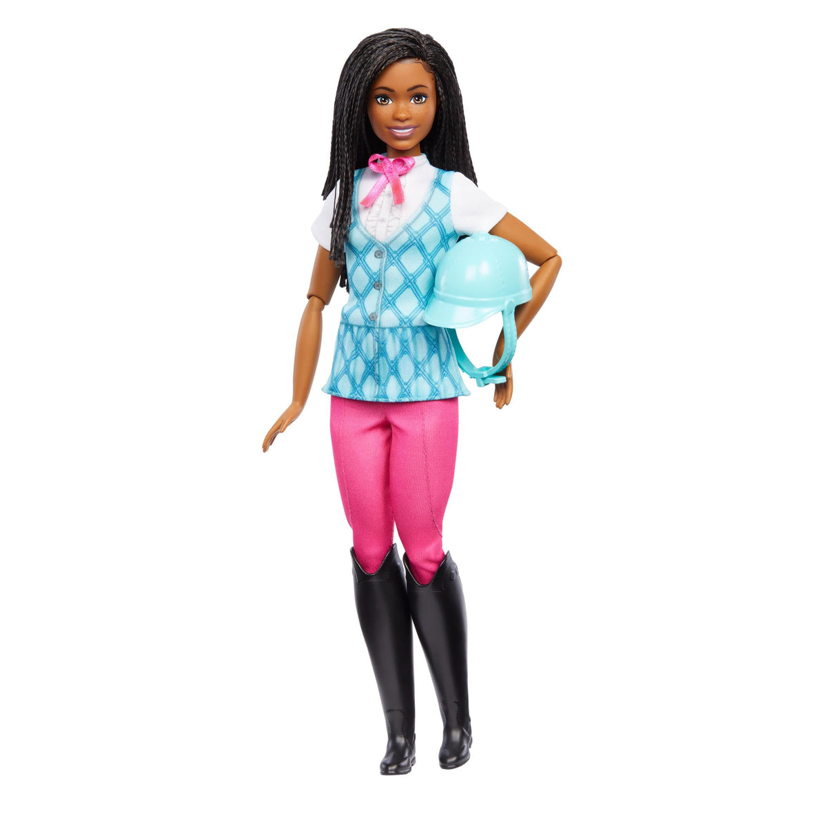 Barbie Brooklyn doll in blue argyle riding vest, pink pants and black boots holding a blue riding helmet