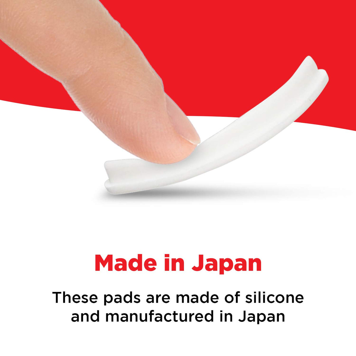 Fingertip pressing a flexible white silicone curler pad, made in Japan