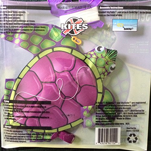 Back of the sea turtle kite package with instructions and the kite visible inside