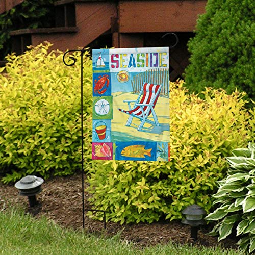 Seaside beach chair flag on a black stand in front of yellow shrubs
