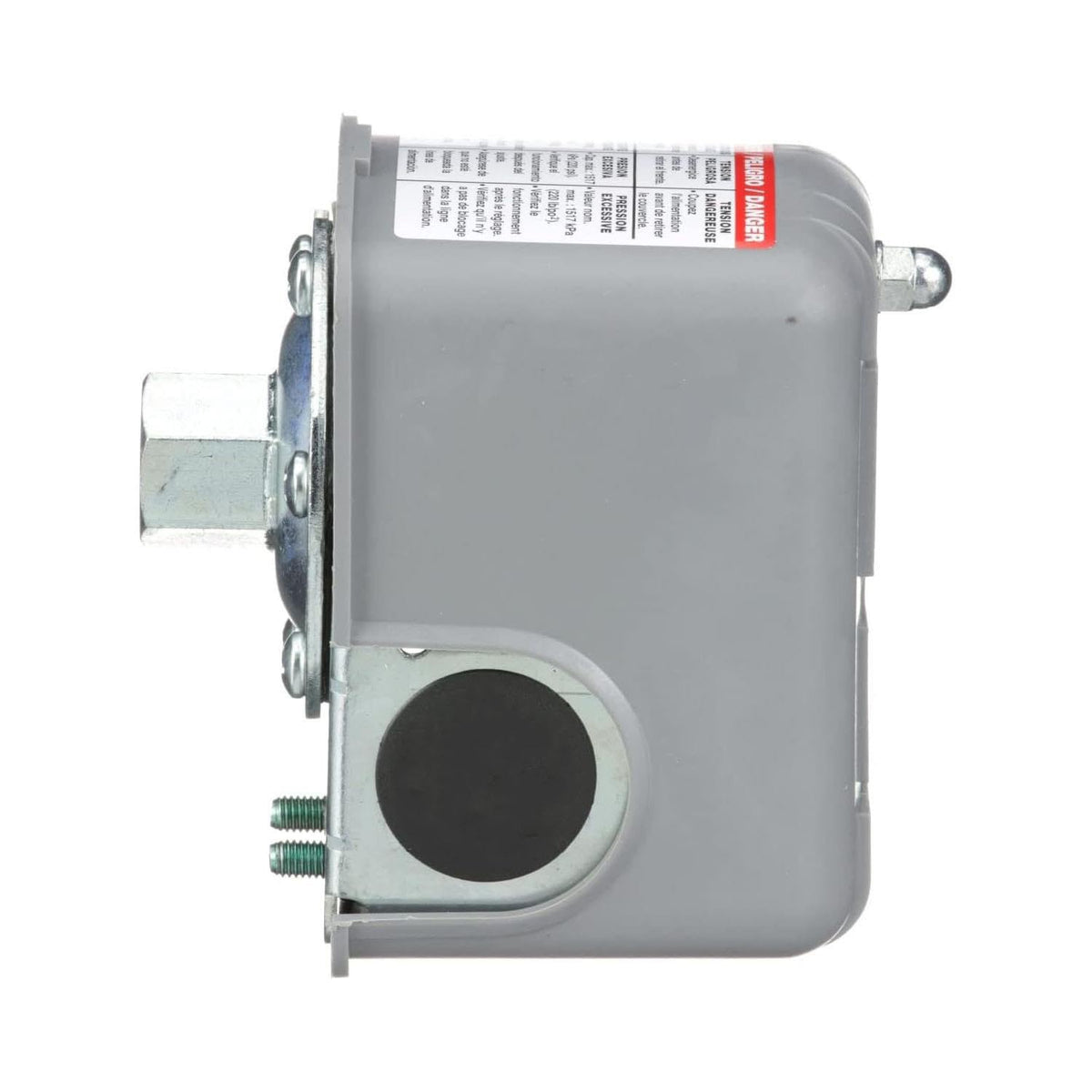 Left side of the grey pressure switch showing the brass fitting and bilingual warning label