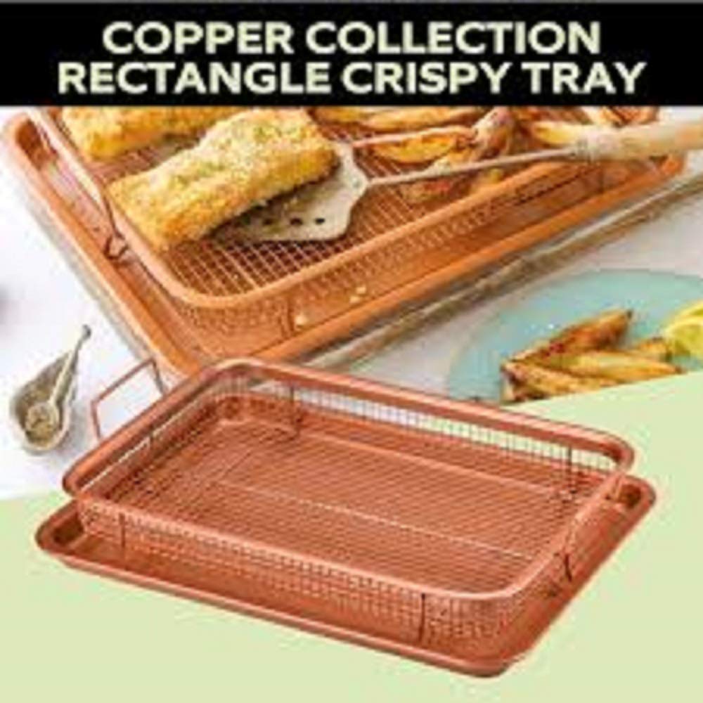 Copper-colour mesh crisper basket on a matching baking tray, with fried fish and wedges