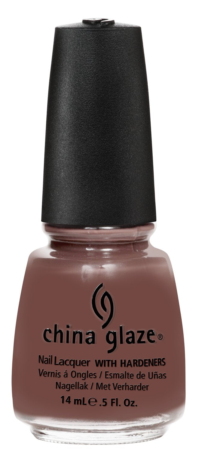 Bottle of cocoa brown creme nail lacquer with a black cap