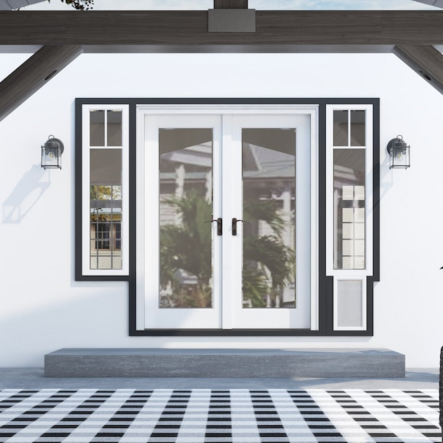 Pair of black lantern wall lights either side of white French doors