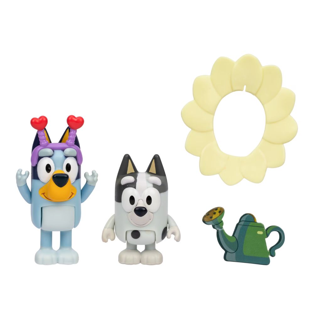 Bluey and Muffin figures out of the box with the yellow flower collar and green watering can