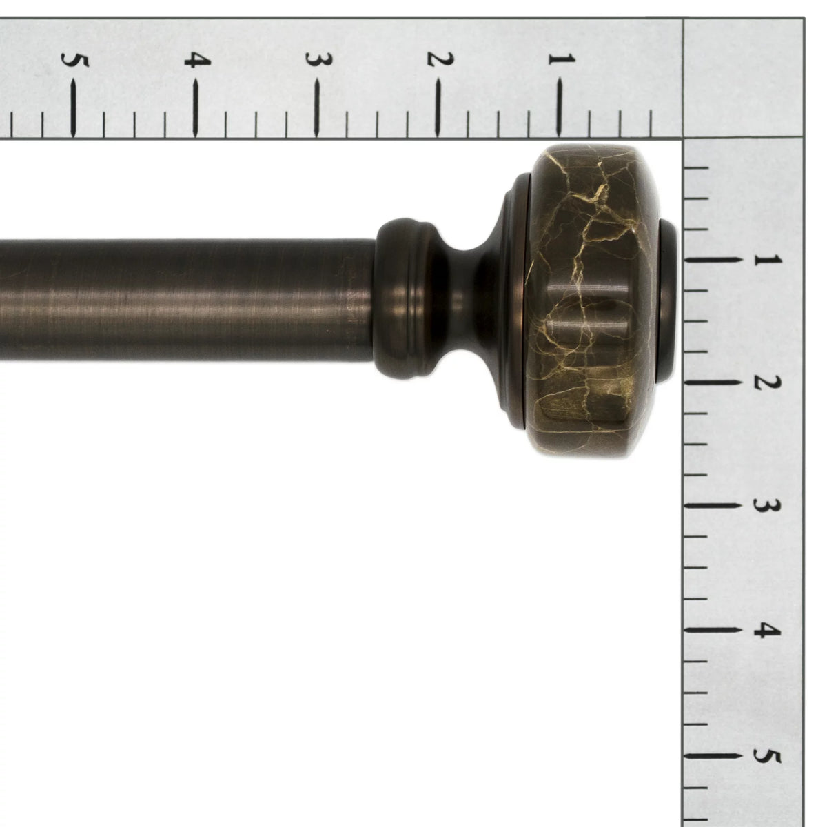 Bronze curtain rod end with a round marble-effect knob finial beside rulers, about 1.5 inches wide