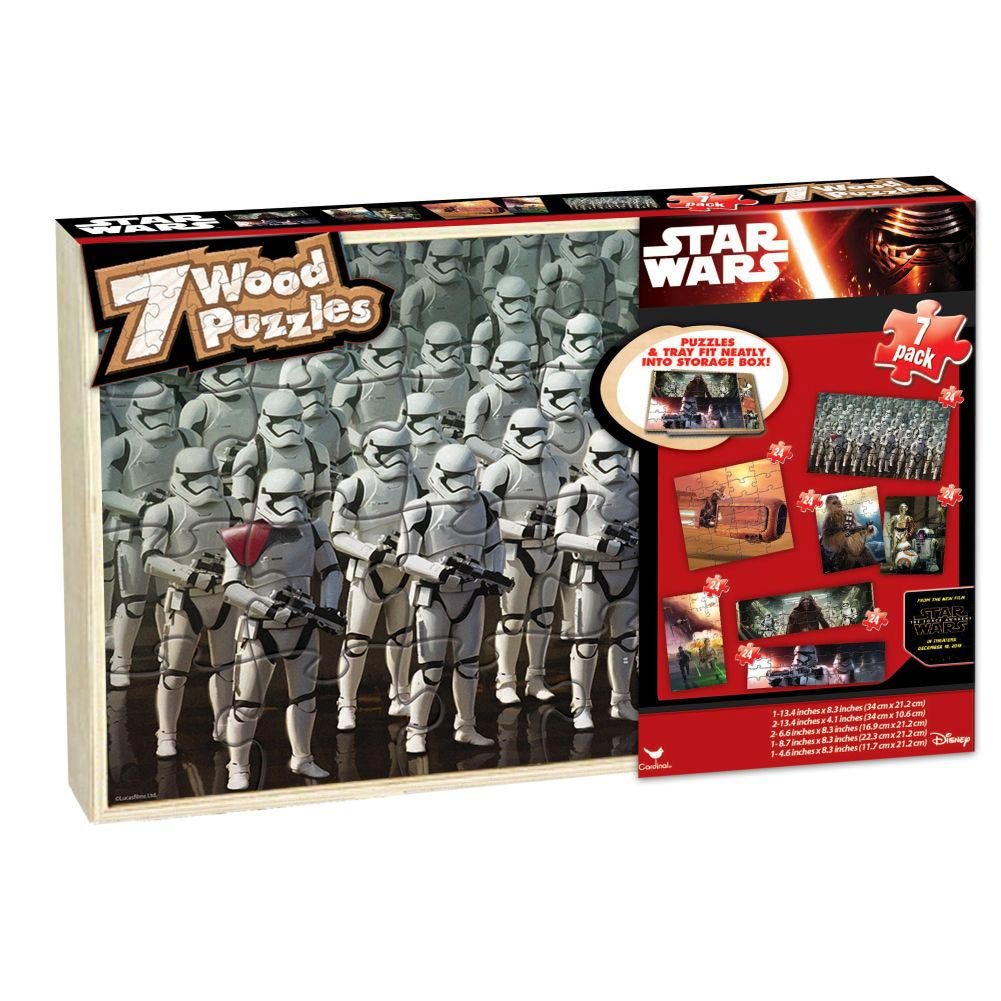 Wooden box of 7 Star Wars jigsaw puzzles with a stormtrooper puzzle on the lid