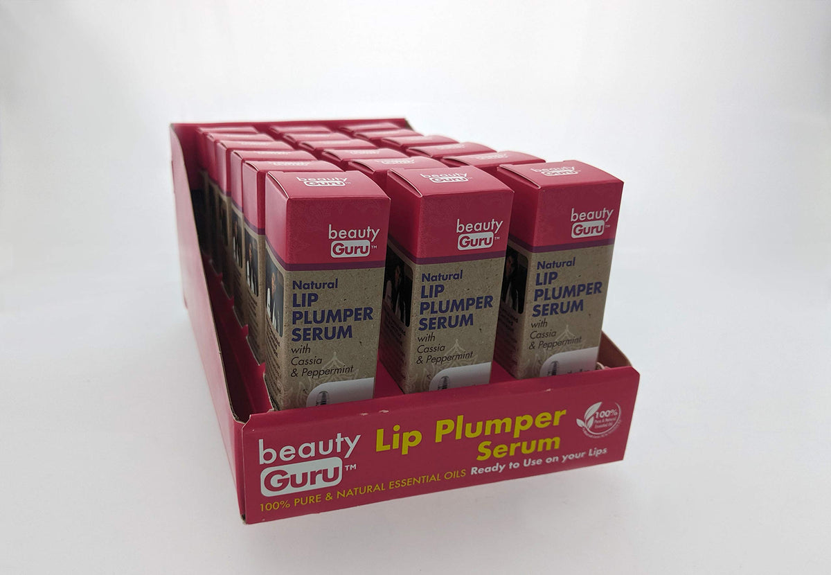 Counter display tray filled with pink boxes of lip plumper serum with cassia and peppermint