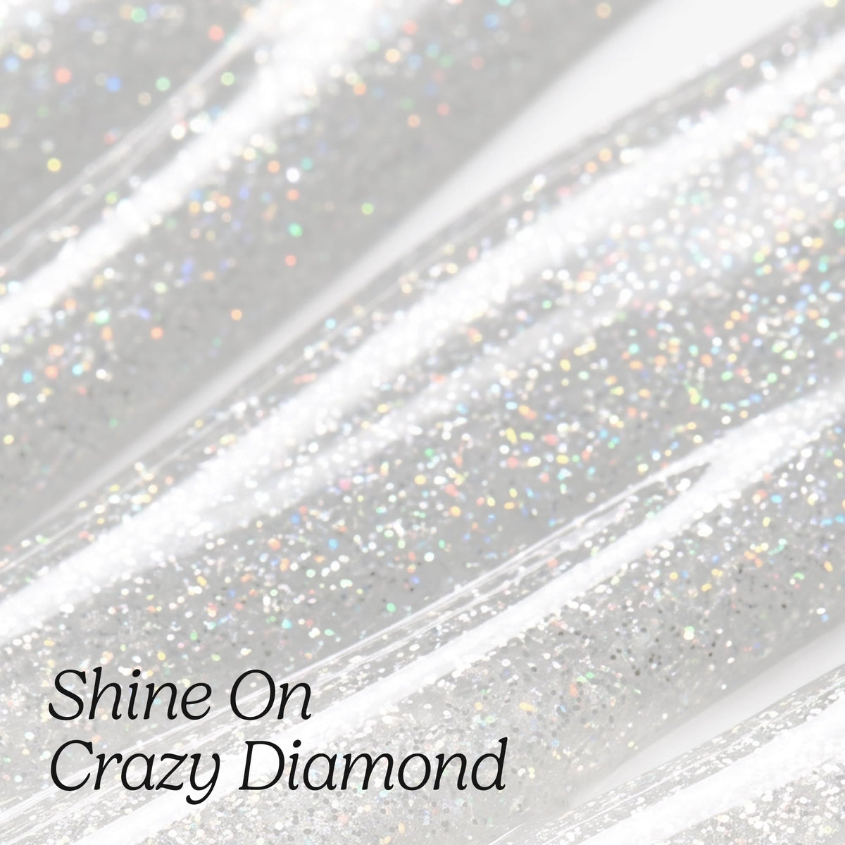 Close-up of brushed silver holographic glitter polish with the shade name Shine On Crazy Diamond