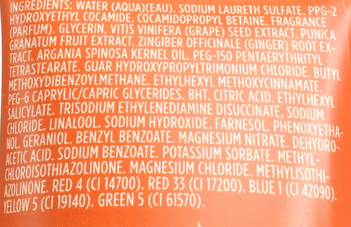 Close-up of the body wash ingredient list printed on the orange tube