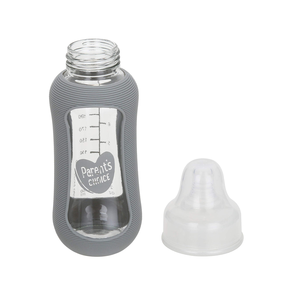 Glass baby bottle in a ribbed grey silicone sleeve beside its clear nipple cap
