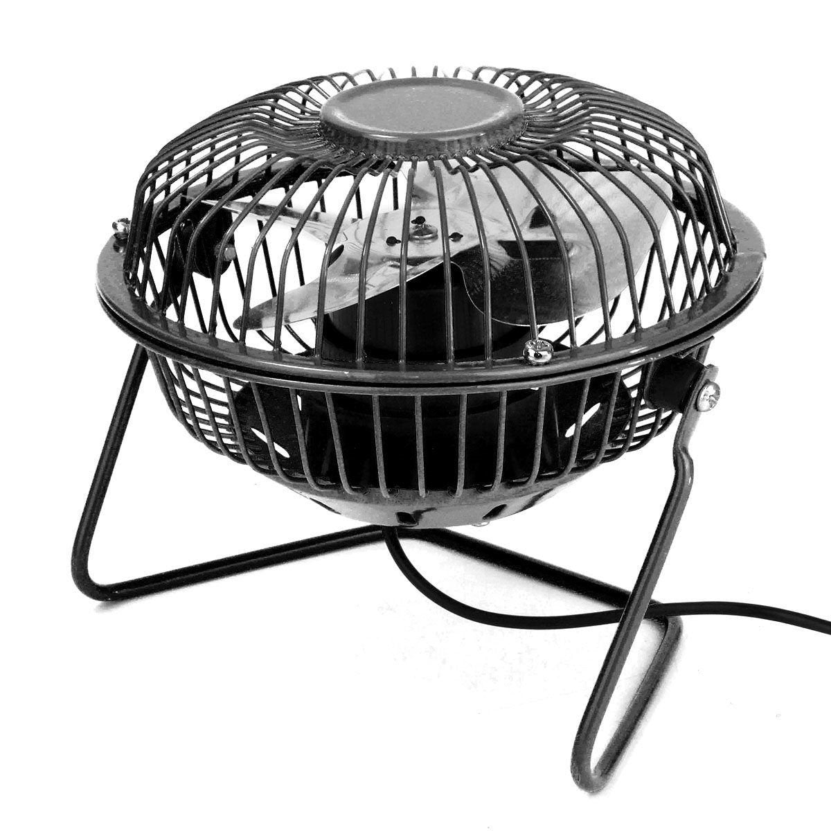 Mini desk fan tilted to point upward on its pivoting wire stand