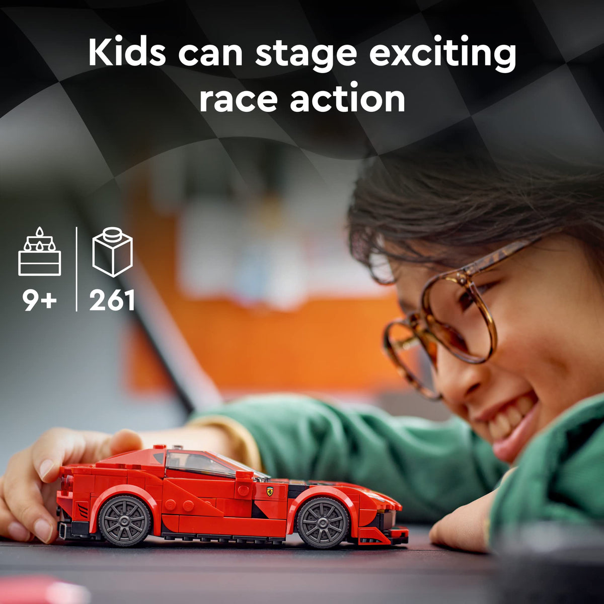 Smiling child in glasses pushing the red brick supercar along a table, ages 9+, 261 pieces