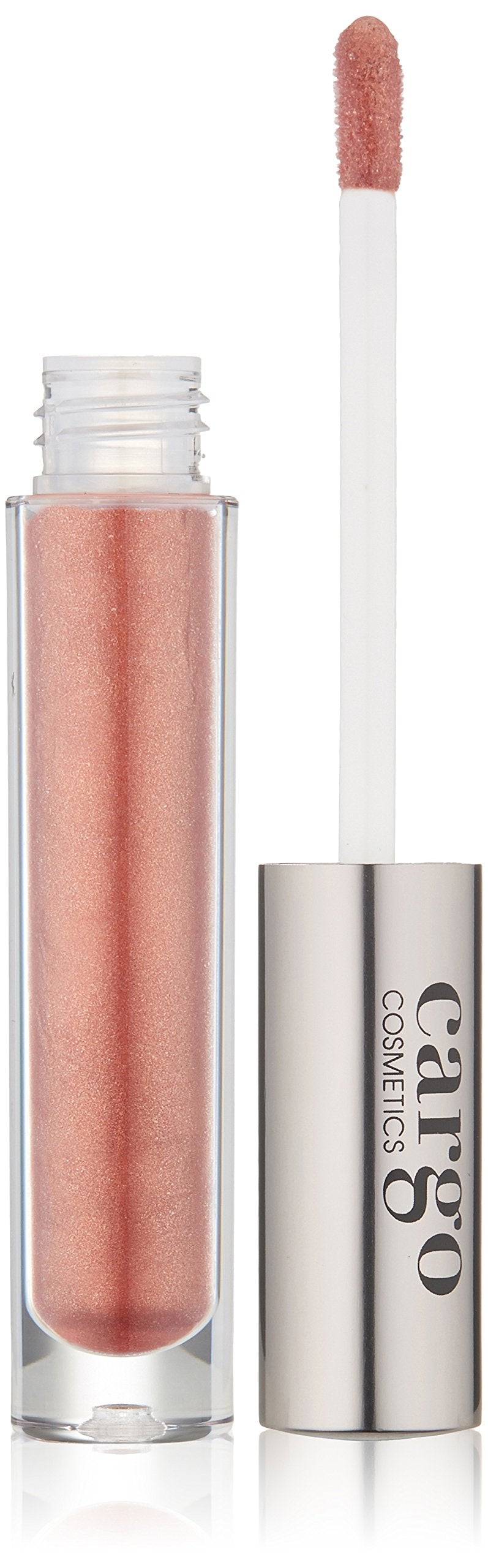 Shimmery peach-pink lip gloss tube open beside its wand applicator and silver cap