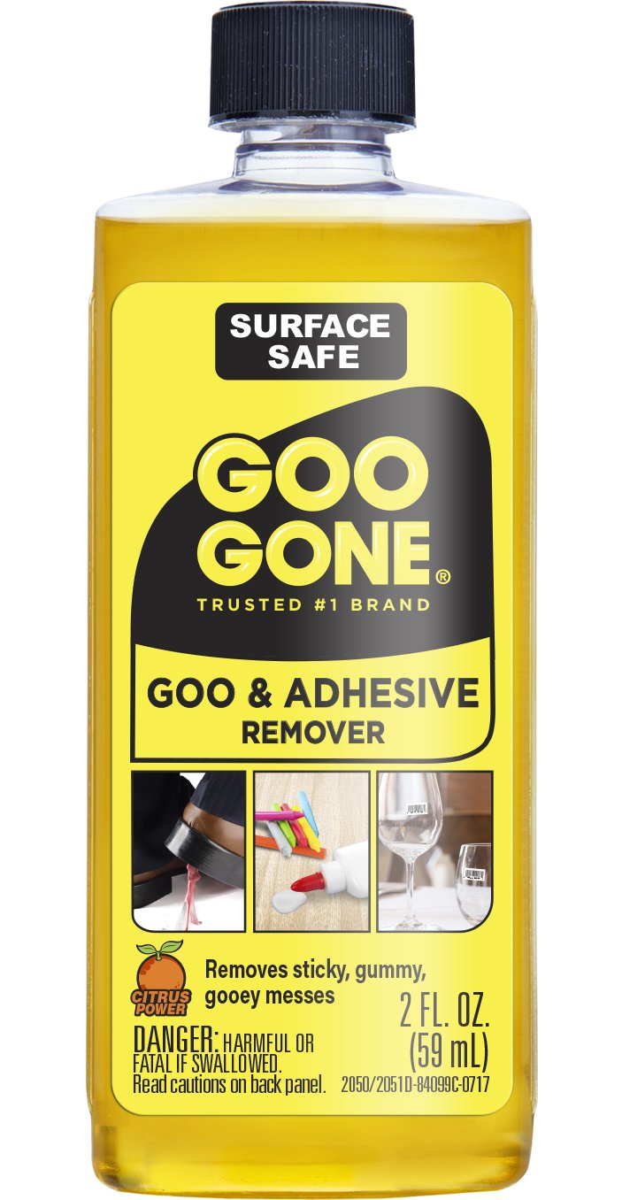 2 oz bottle of yellow goo and adhesive remover with a black cap