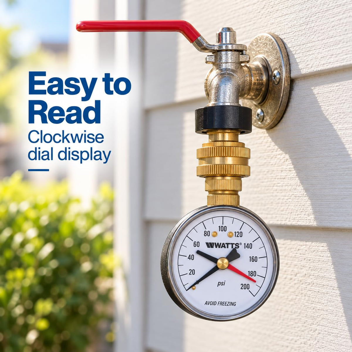 Watts pressure gauge fitted to an outdoor tap with a red lever handle