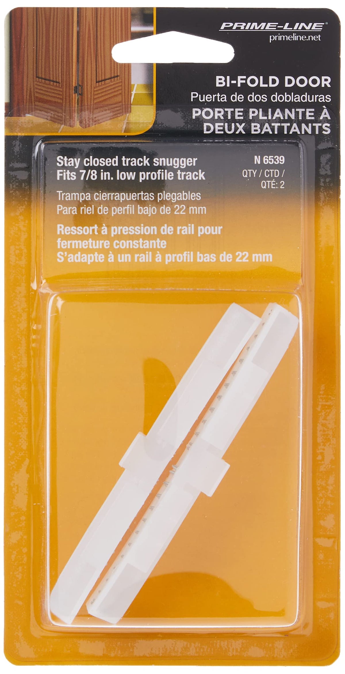 Two white track snuggers in an orange blister card for 7/8 inch low profile track