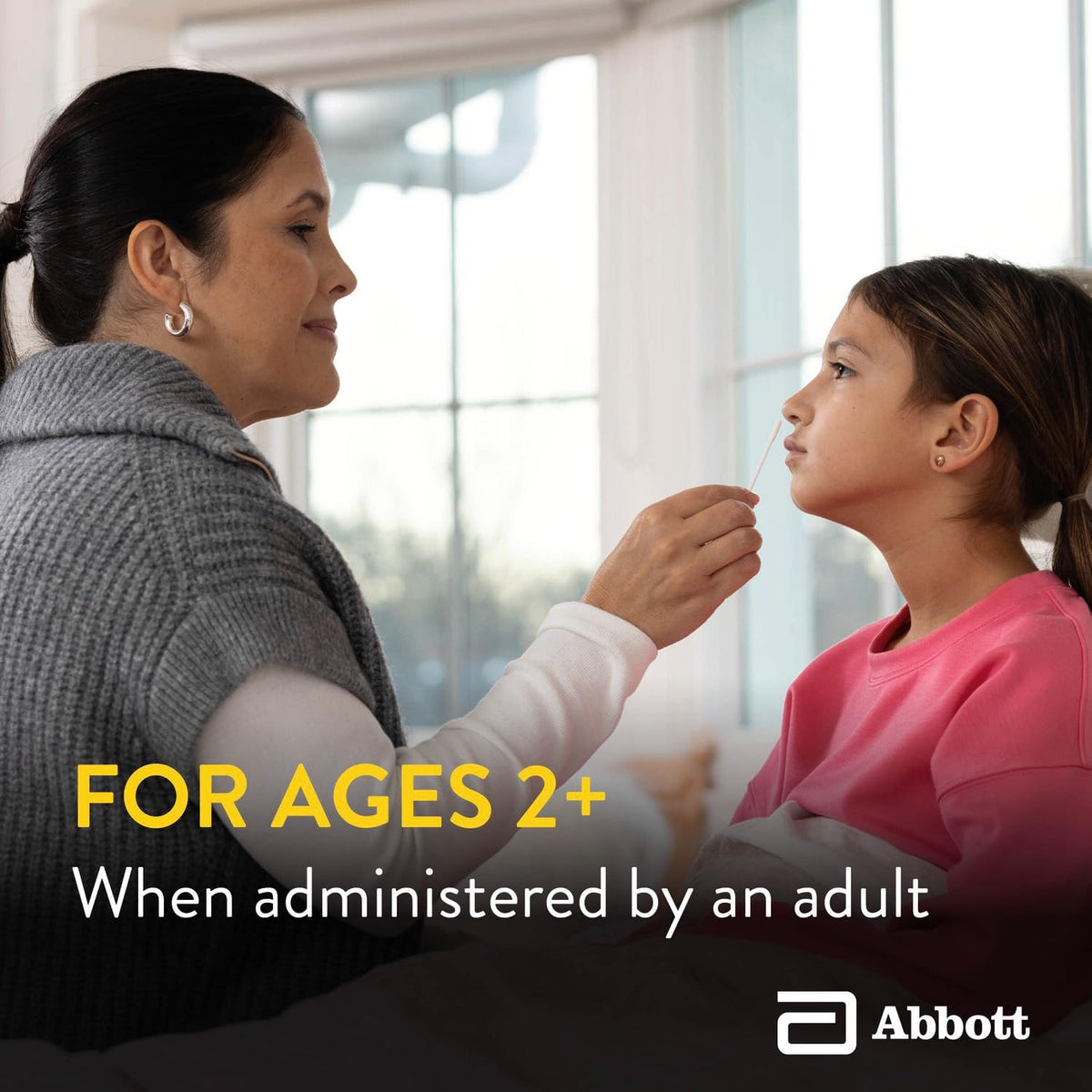 Adult swabbing a girl's nose at home, for ages 2 and up when given by an adult