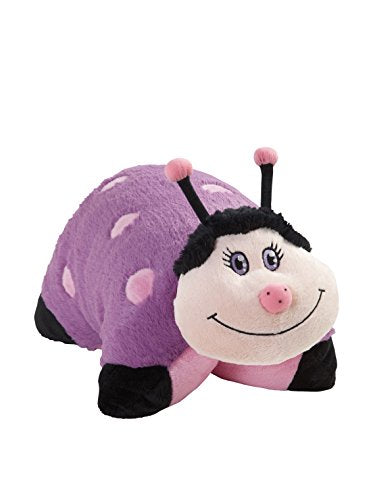 Purple ladybug plush pillow with pink spots, black antennae and a smiling face