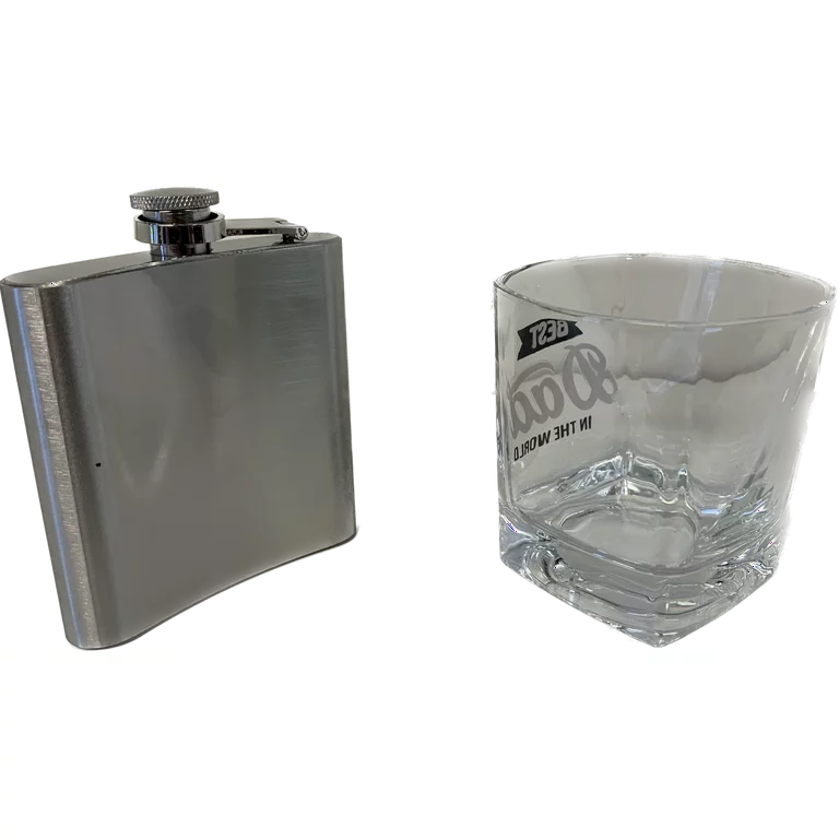 Plain back of the brushed steel flask beside the square rocks glass