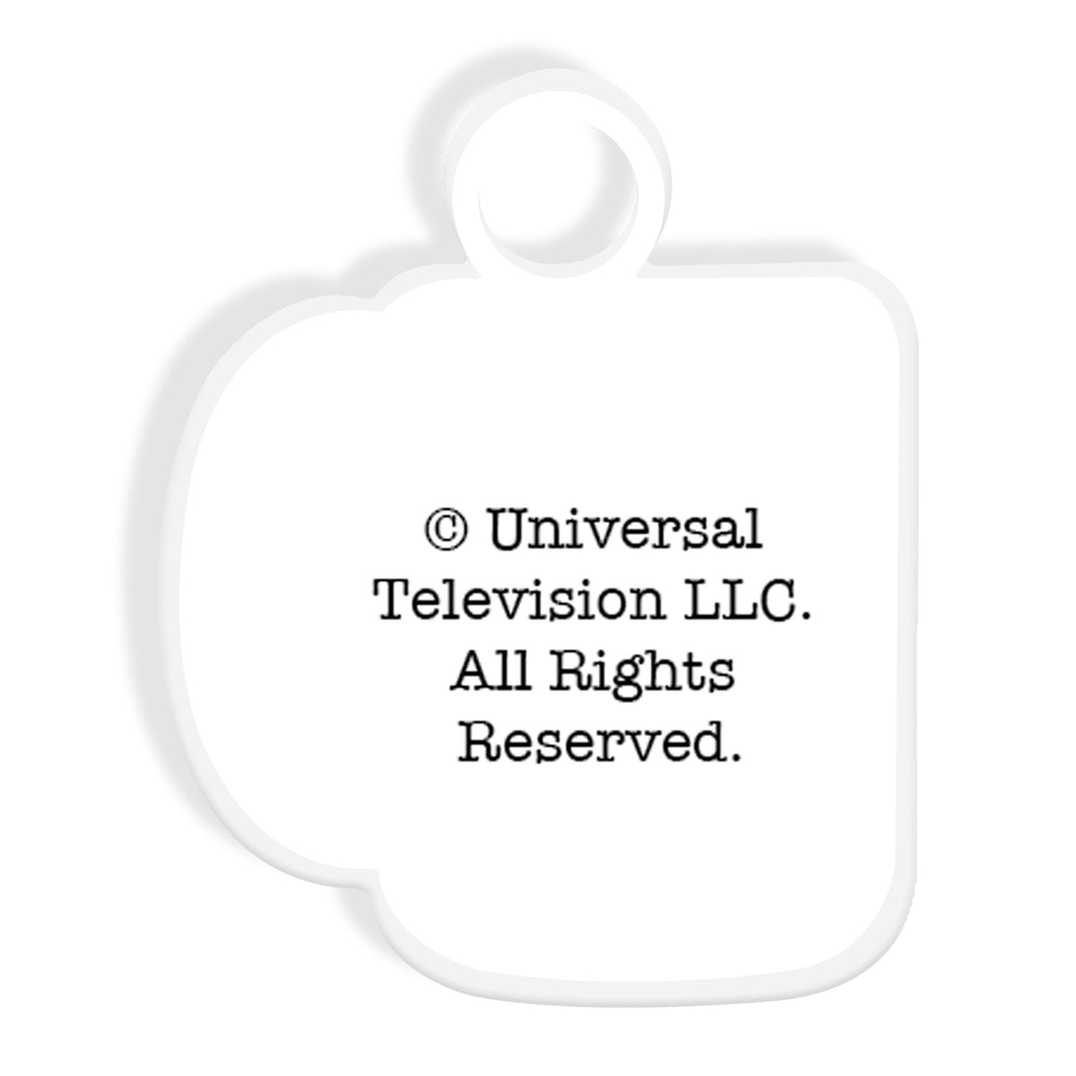 Back of the mug-shaped zipper charm with a Universal Television copyright