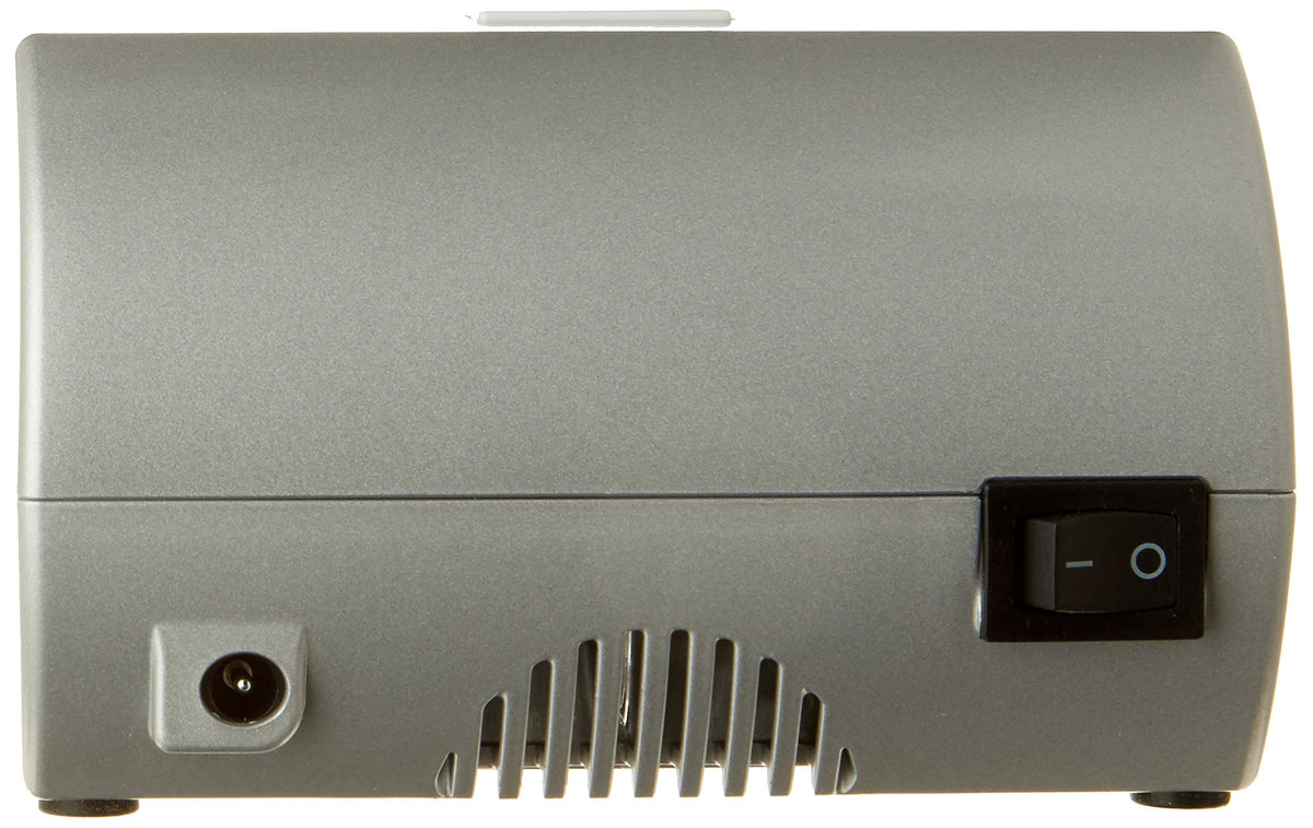 Back of the silver nail lamp with power socket, vent and on-off switch