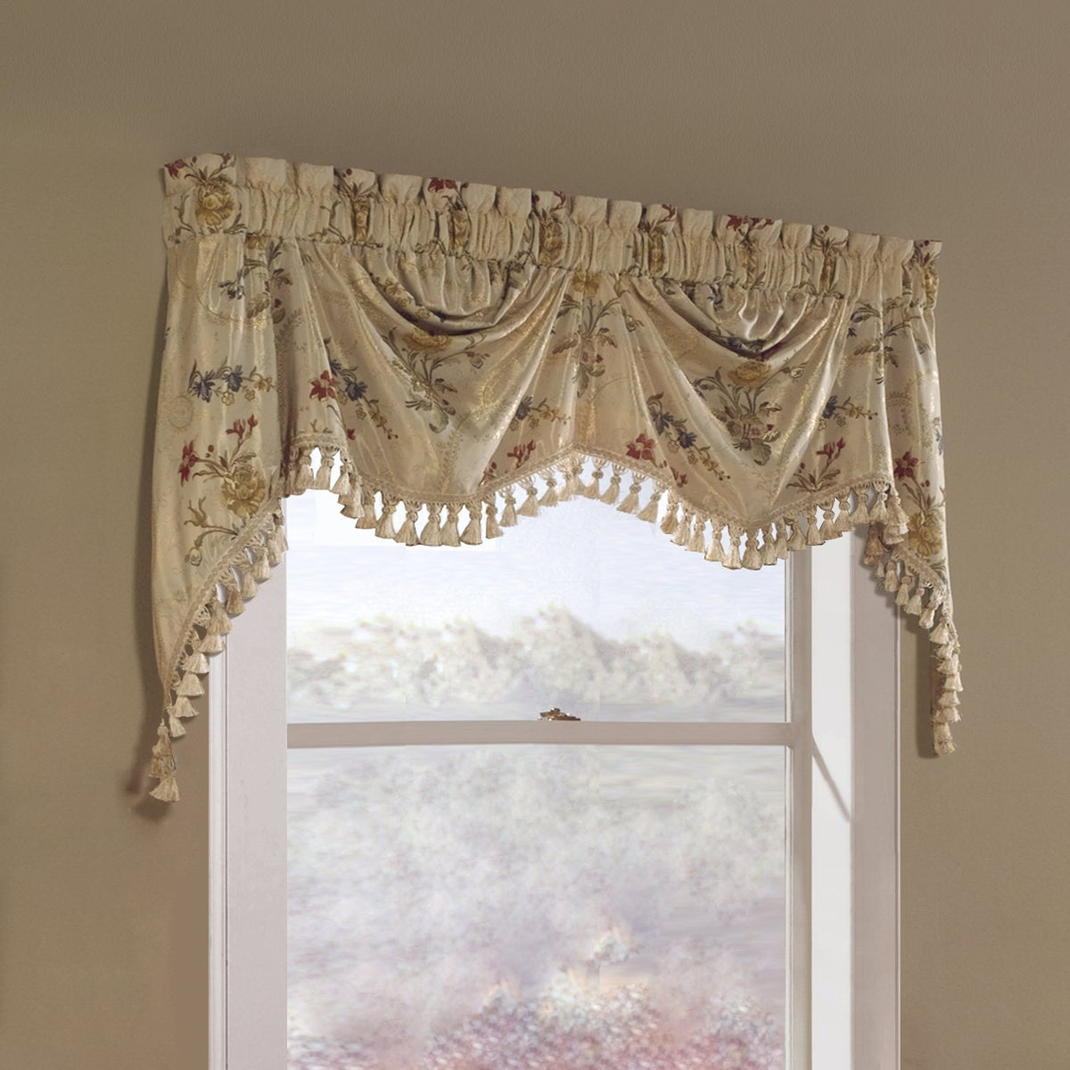 Cream jacquard Austrian valance with red and blue flowers and tassel fringe above a window