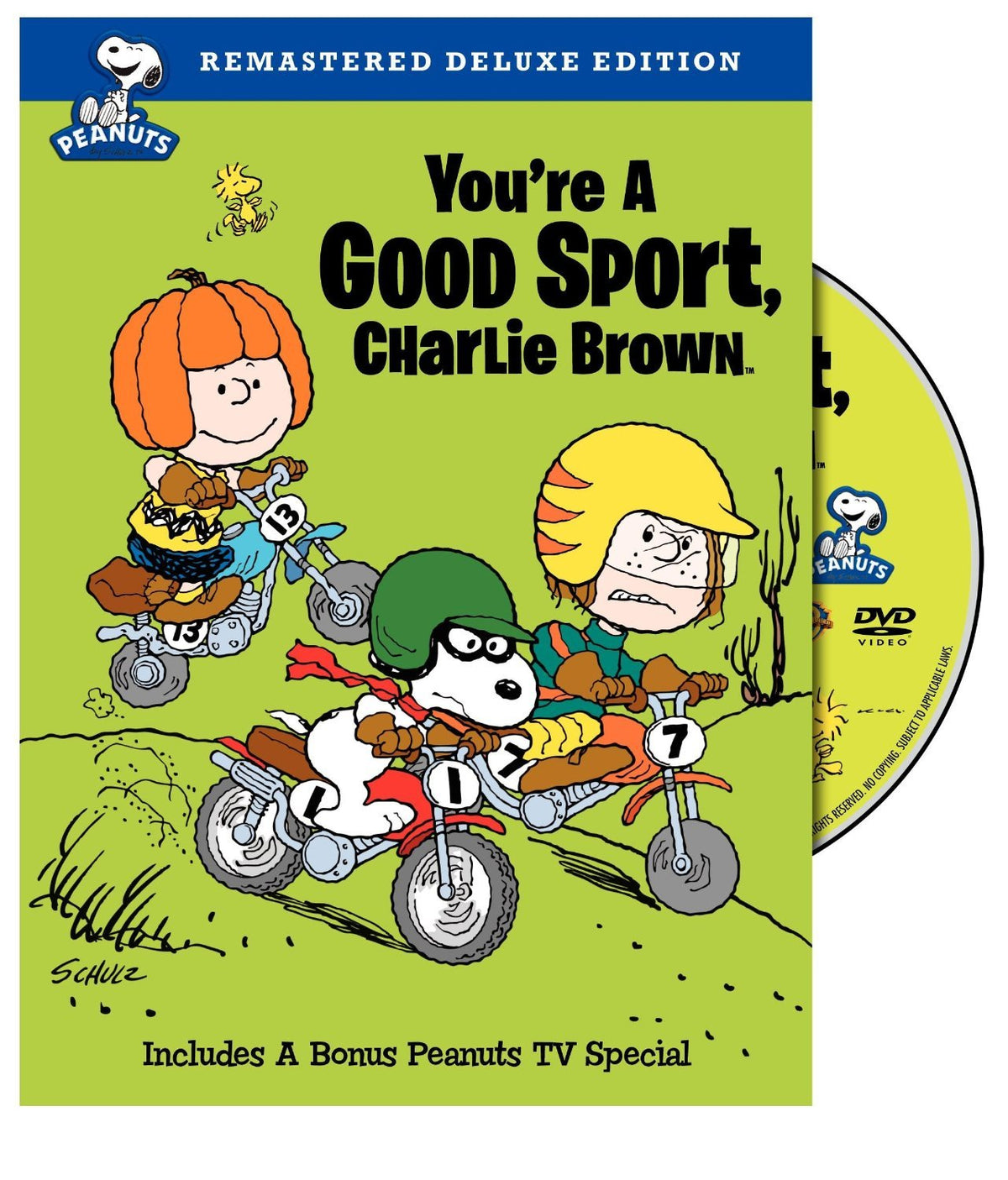 Green cartoon DVD cover with a beagle and kids racing motorbikes, disc beside the case