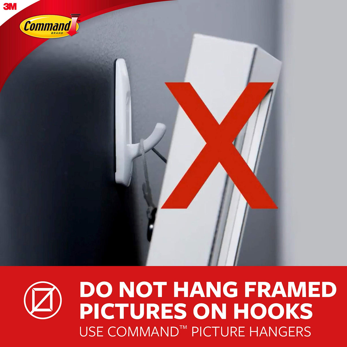 White adhesive hook with a framed picture crossed out, do not hang framed pictures