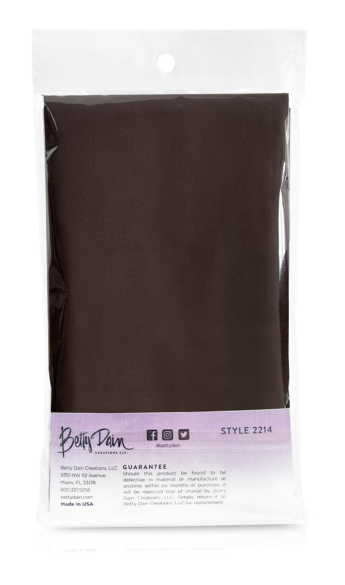 Back of the bagged brown apron with the guarantee and Made in USA card