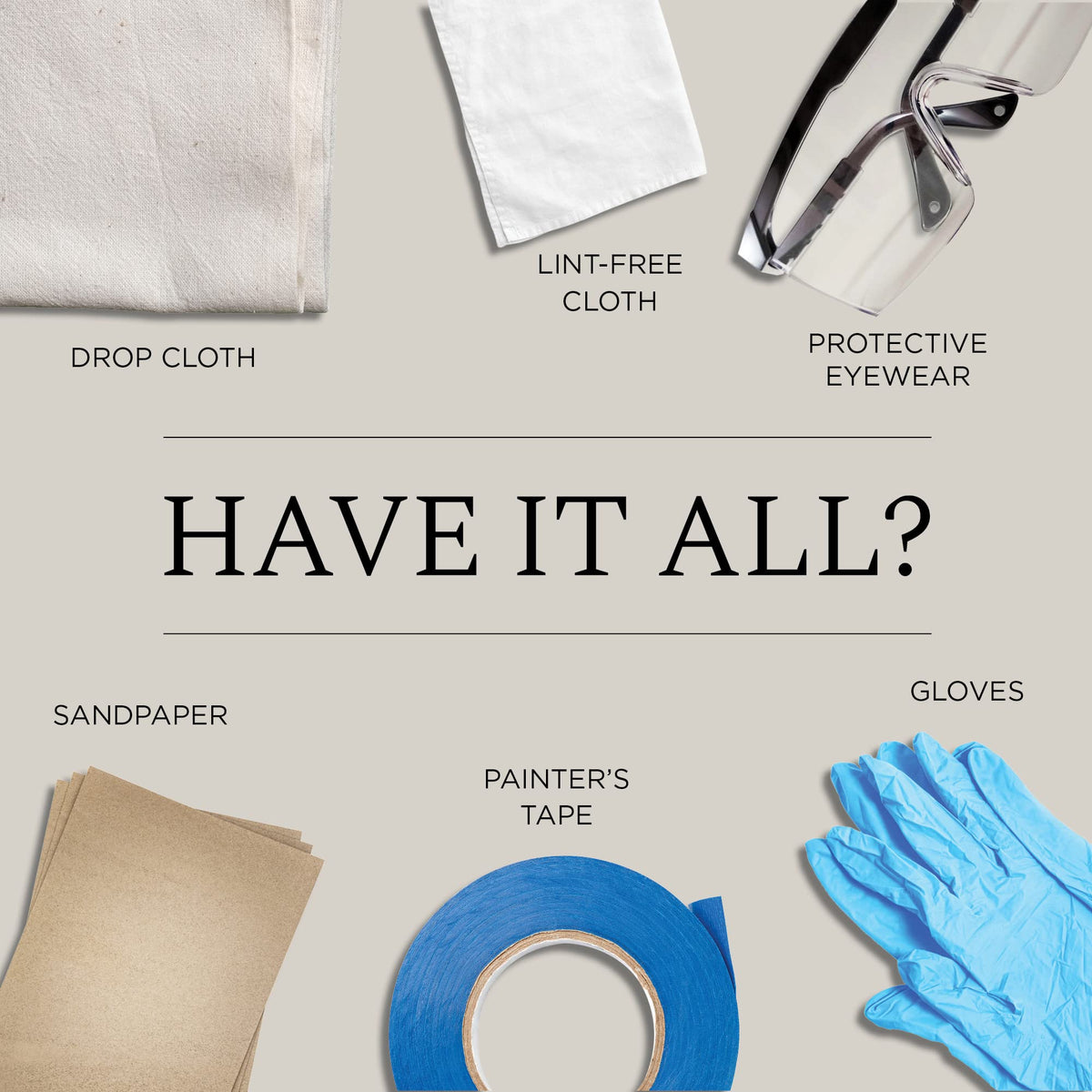 Painting supplies flat lay: drop cloth, cloth, eyewear, sandpaper, painter's tape and gloves