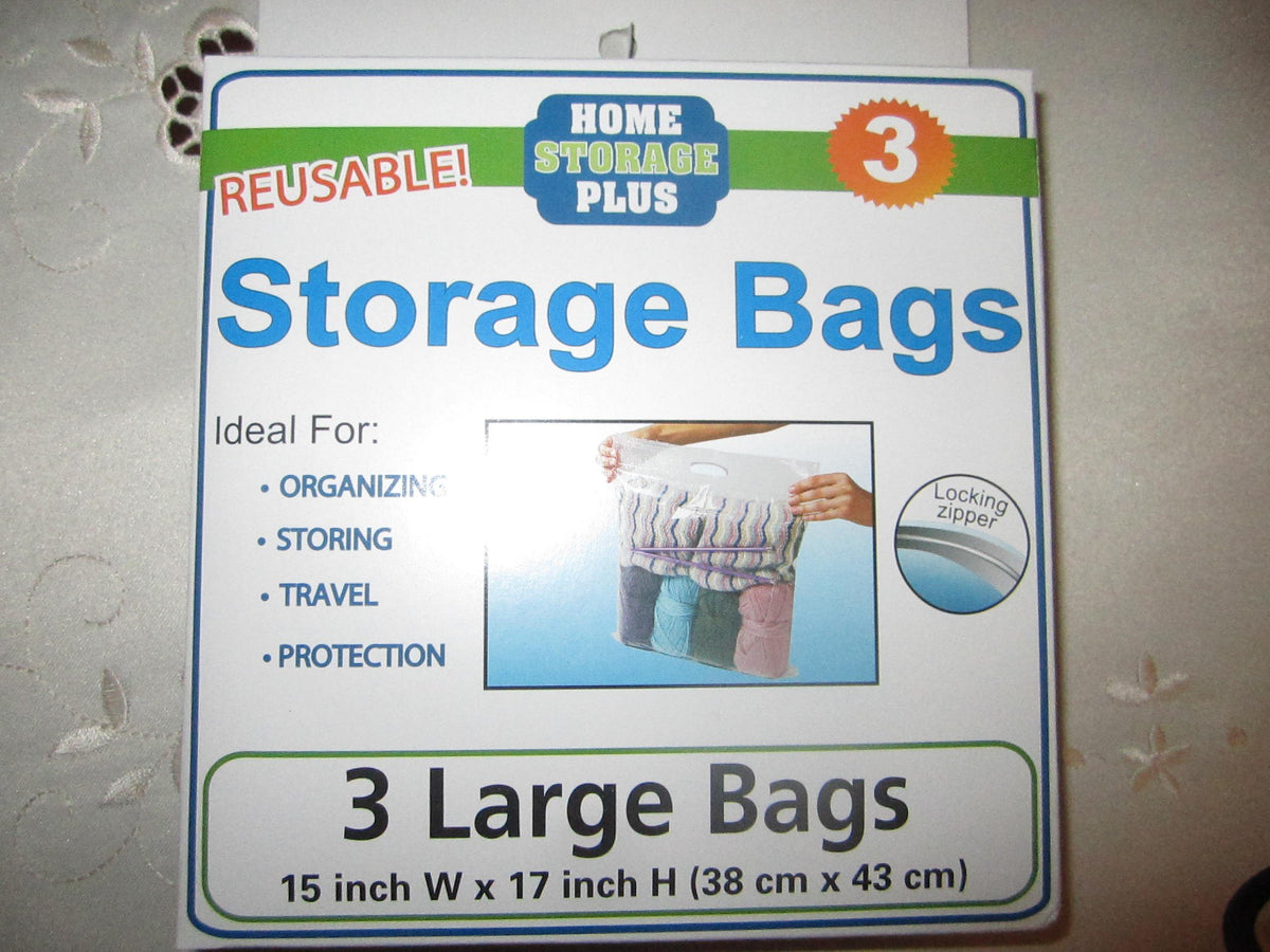 Box of 3 reusable 15 by 17 inch zip storage bags showing a bag of yarn and sweaters