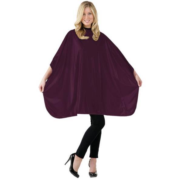 Woman holding out a burgundy nylon shampoo cape with a snap neck