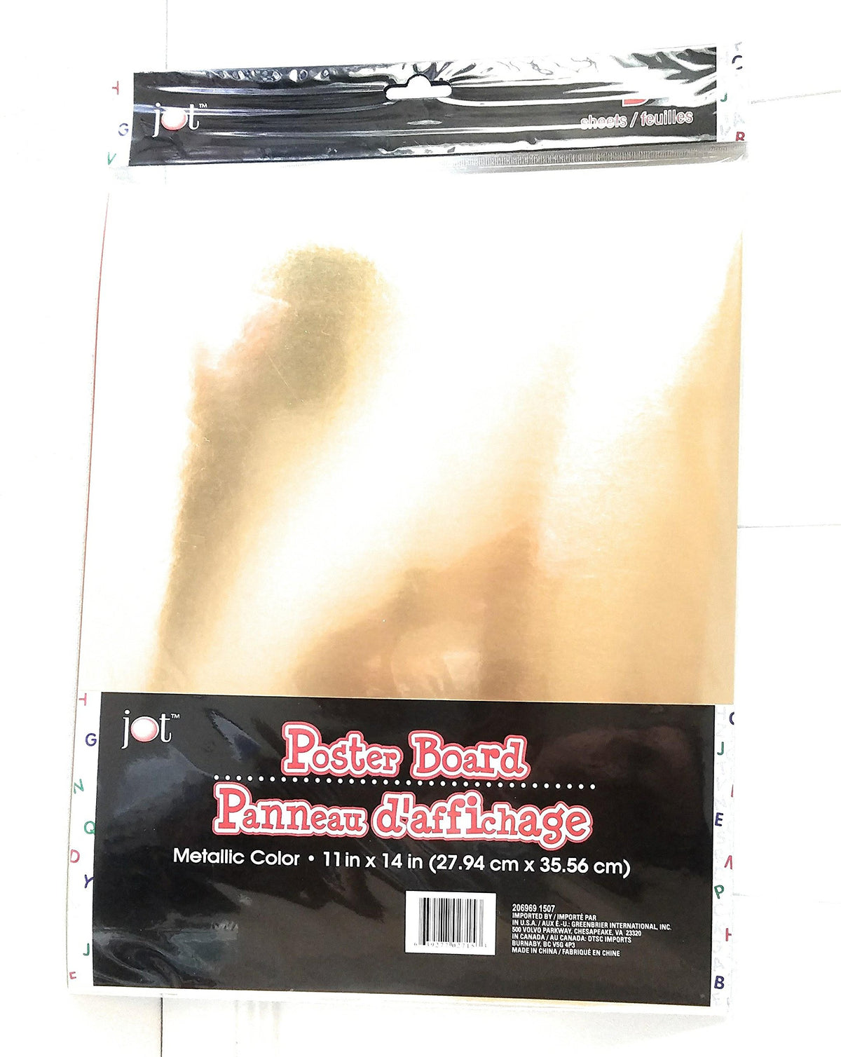 Pack of gold metallic poster board with light glare across the wrapper