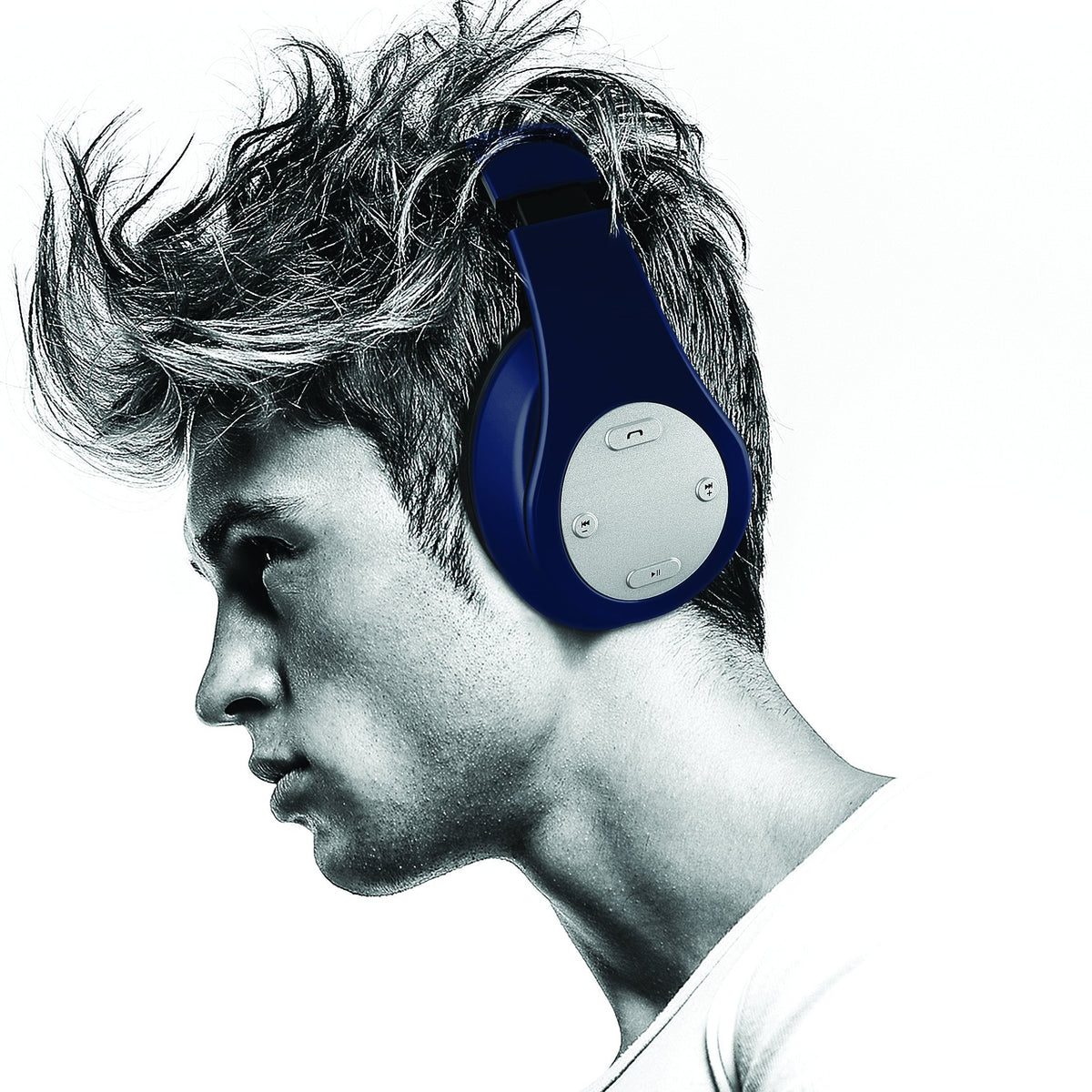 Man in profile wearing the blue over-ear headphones against a plain background