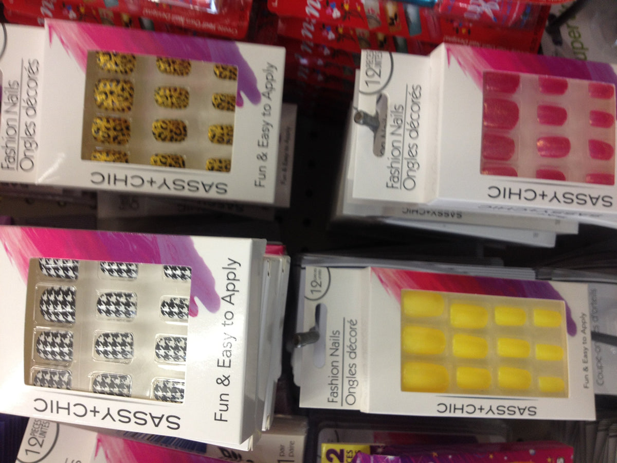 Store shelf of Sassy and Chic press-on nails in leopard, pink, houndstooth and yellow