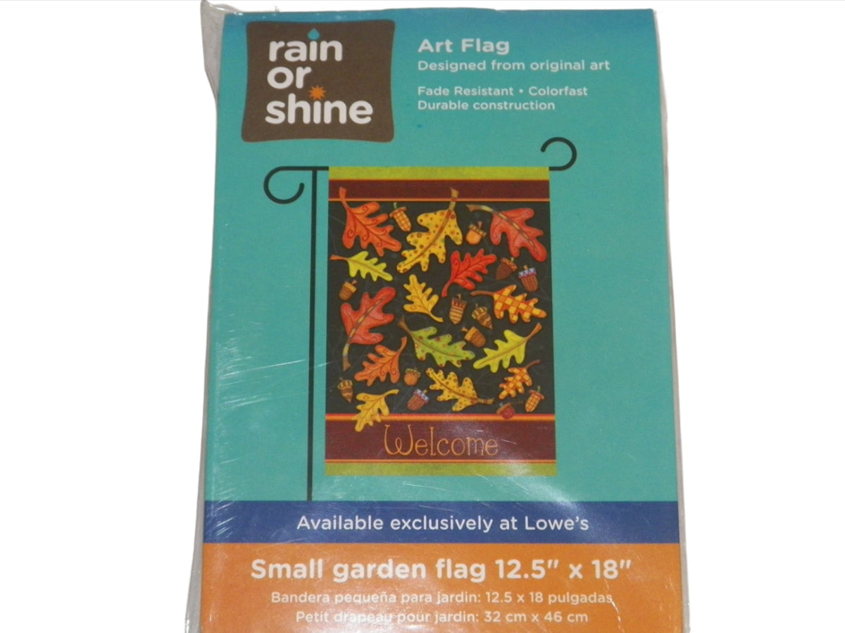 Packaged garden flag with orange and yellow oak leaves and acorns on black above Welcome