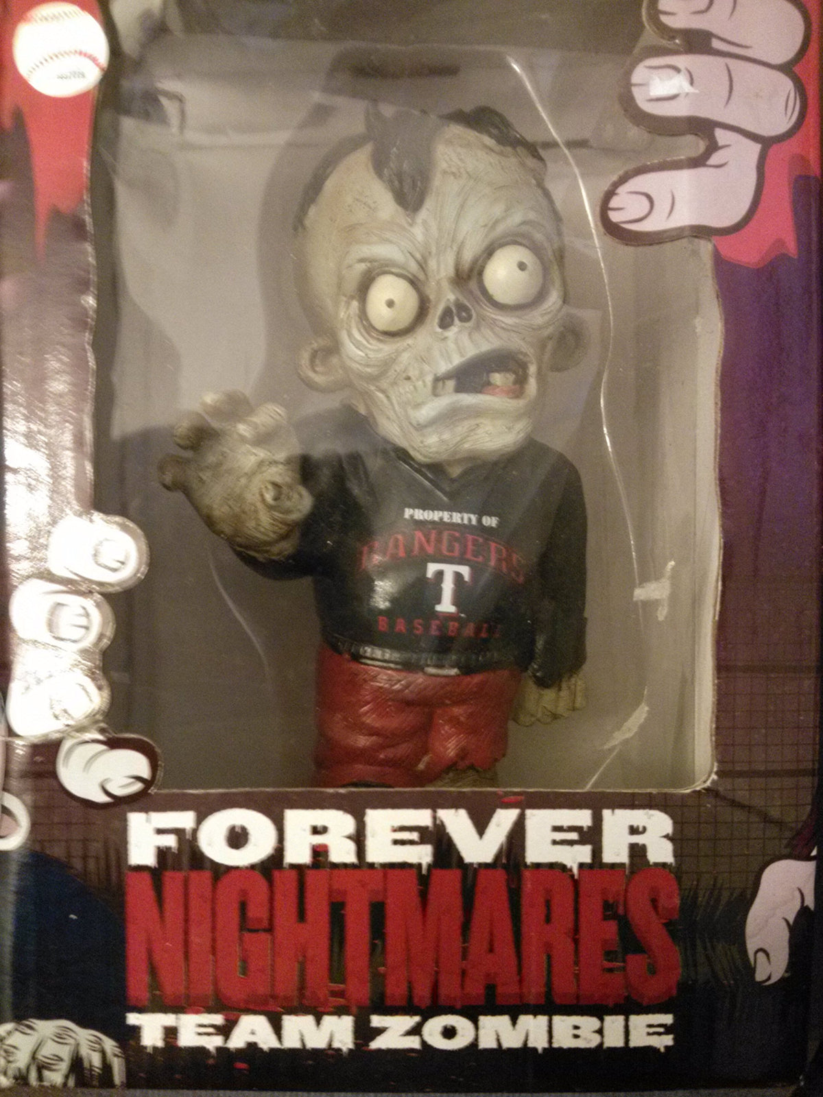 Forever Nightmares zombie figure in Texas Rangers baseball shirt inside its window box