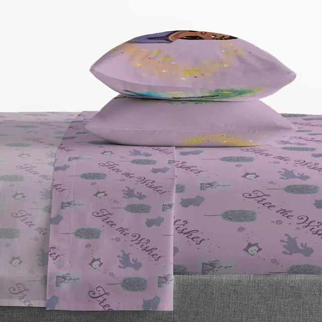 Two lilac pillows stacked on the Free the Wishes print sheets