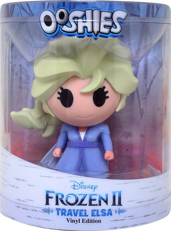 Big-headed vinyl figure of a blonde heroine in a lilac travel outfit in a round tube