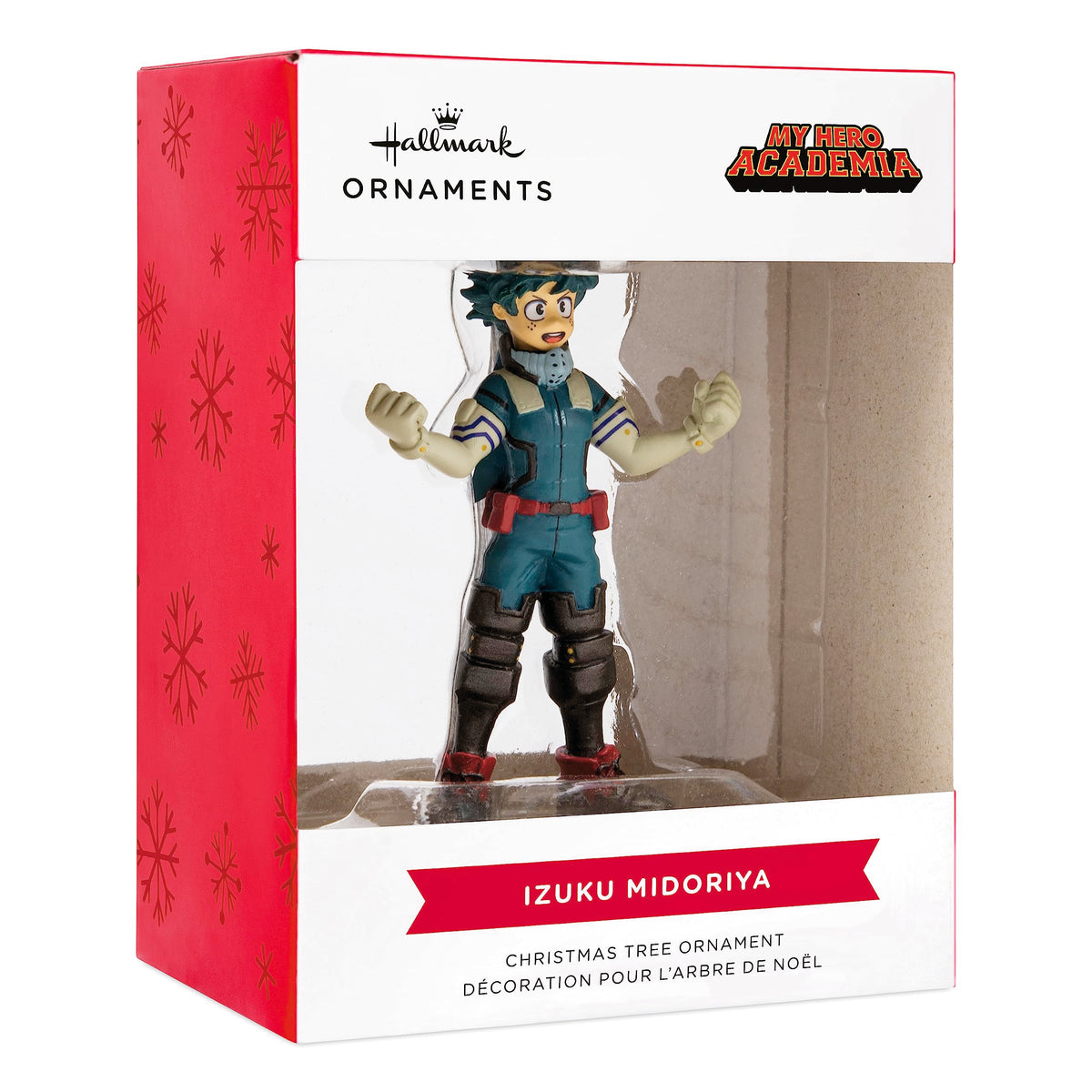 Green-haired hero ornament in its red and white snowflake window box