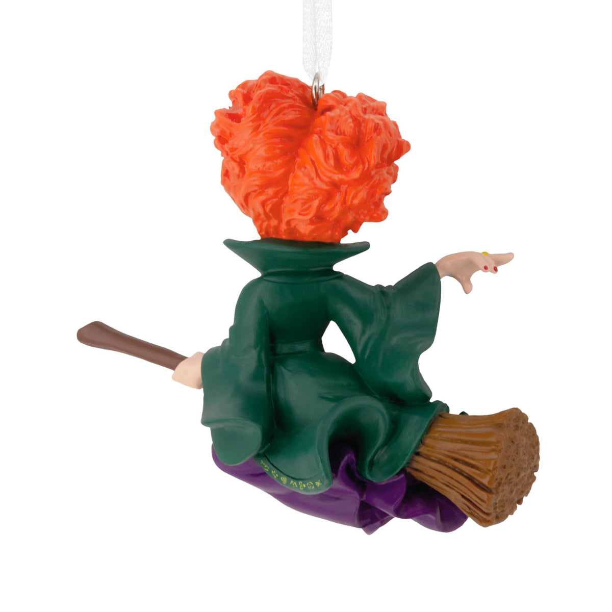 Back of the witch ornament showing her curly red hair and green robe
