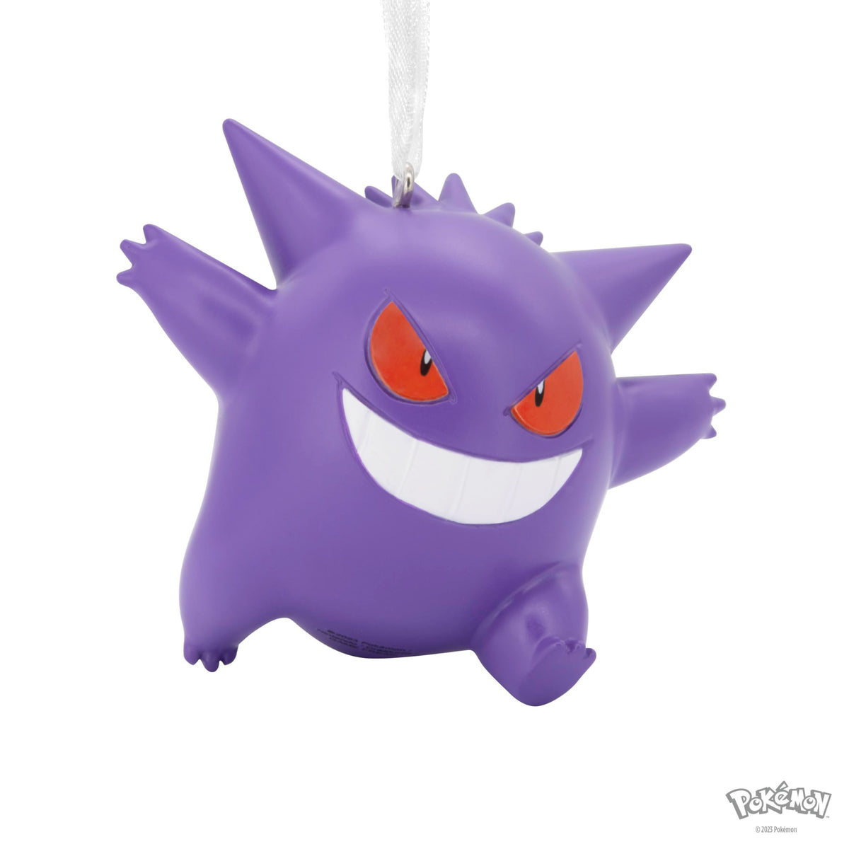 Purple spiky ghost ornament with a wide white grin and red eyes, side angle