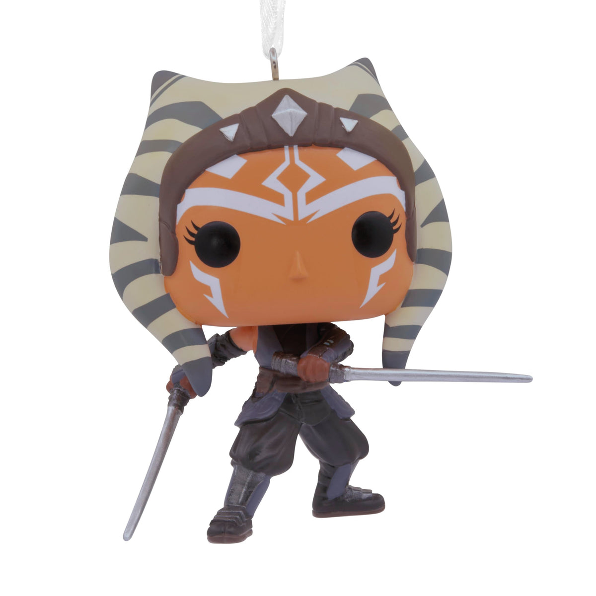 Big-head vinyl ornament of an orange-skinned warrior with striped head-tails and two silver blades