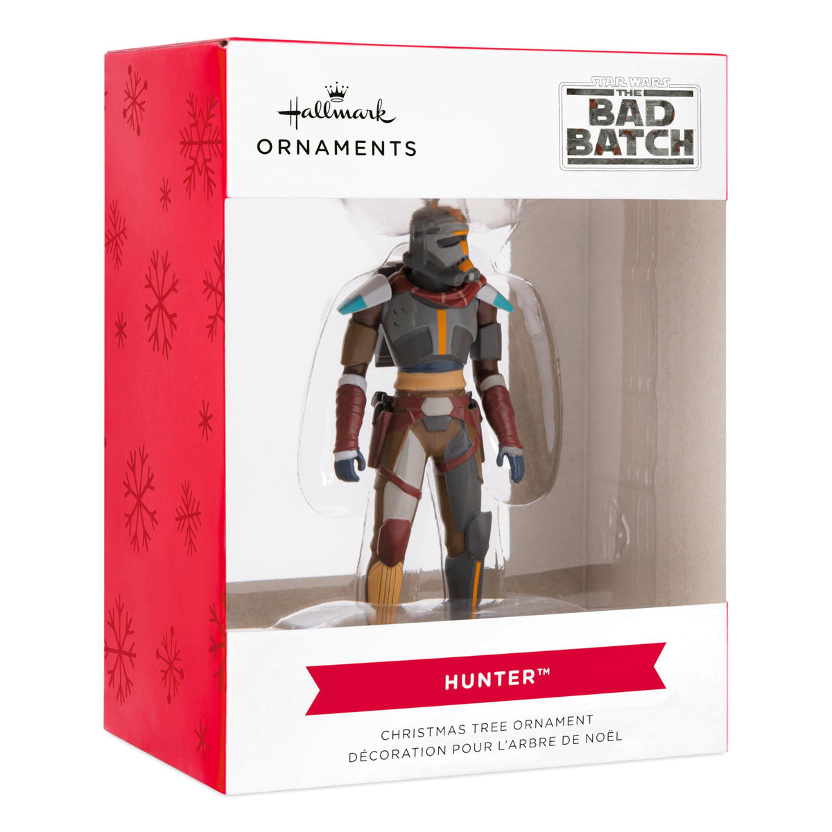 Armoured soldier ornament in its red and white snowflake window box