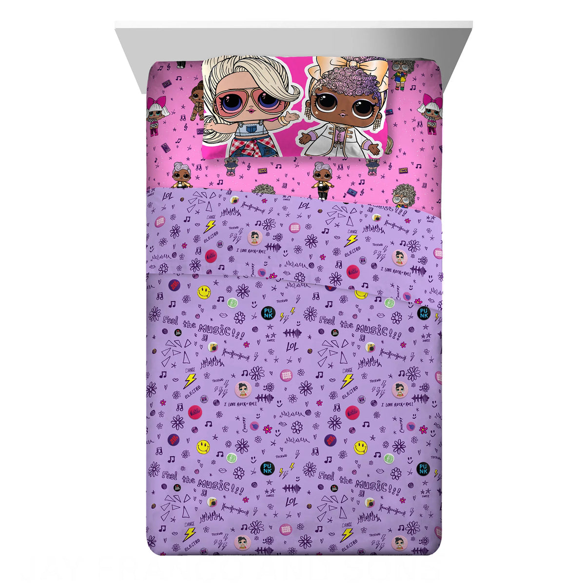 Purple music doodle flat sheet over a pink fitted sheet and doll pillowcase