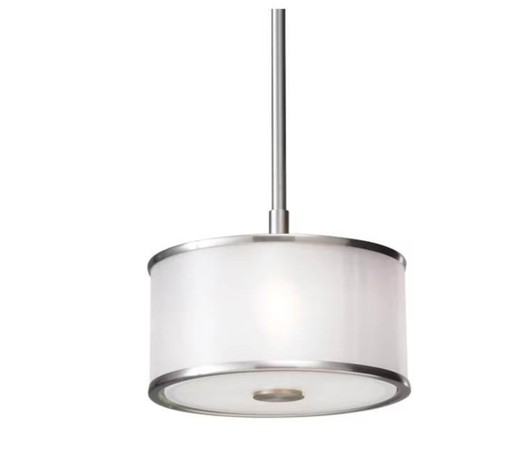 Close-up of the drum pendant's white shade with brushed steel rims and frosted glass diffuser