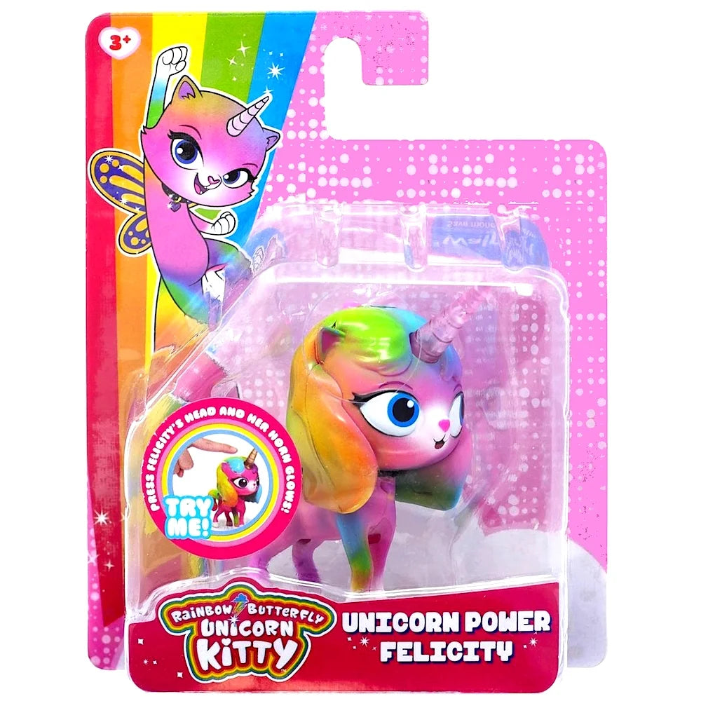 Carded unicorn kitty figure with a rainbow mane and a horn that glows when its head is pressed