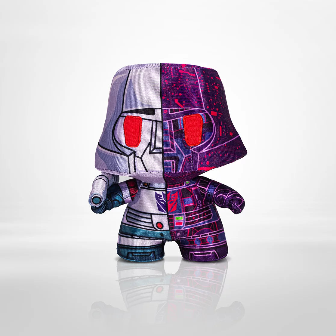 Megatron designer plush, half silver robot and half purple circuit print
